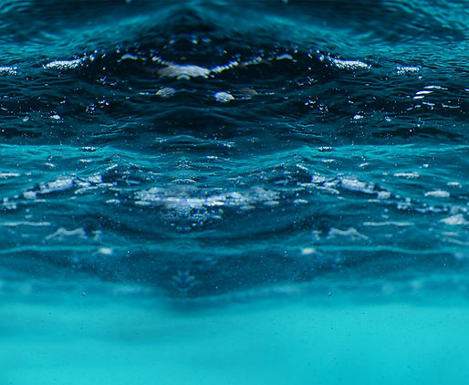 NOOA One Ocean, tagline "One Ocean. One Objective" with a blue ocean, gently rippling.